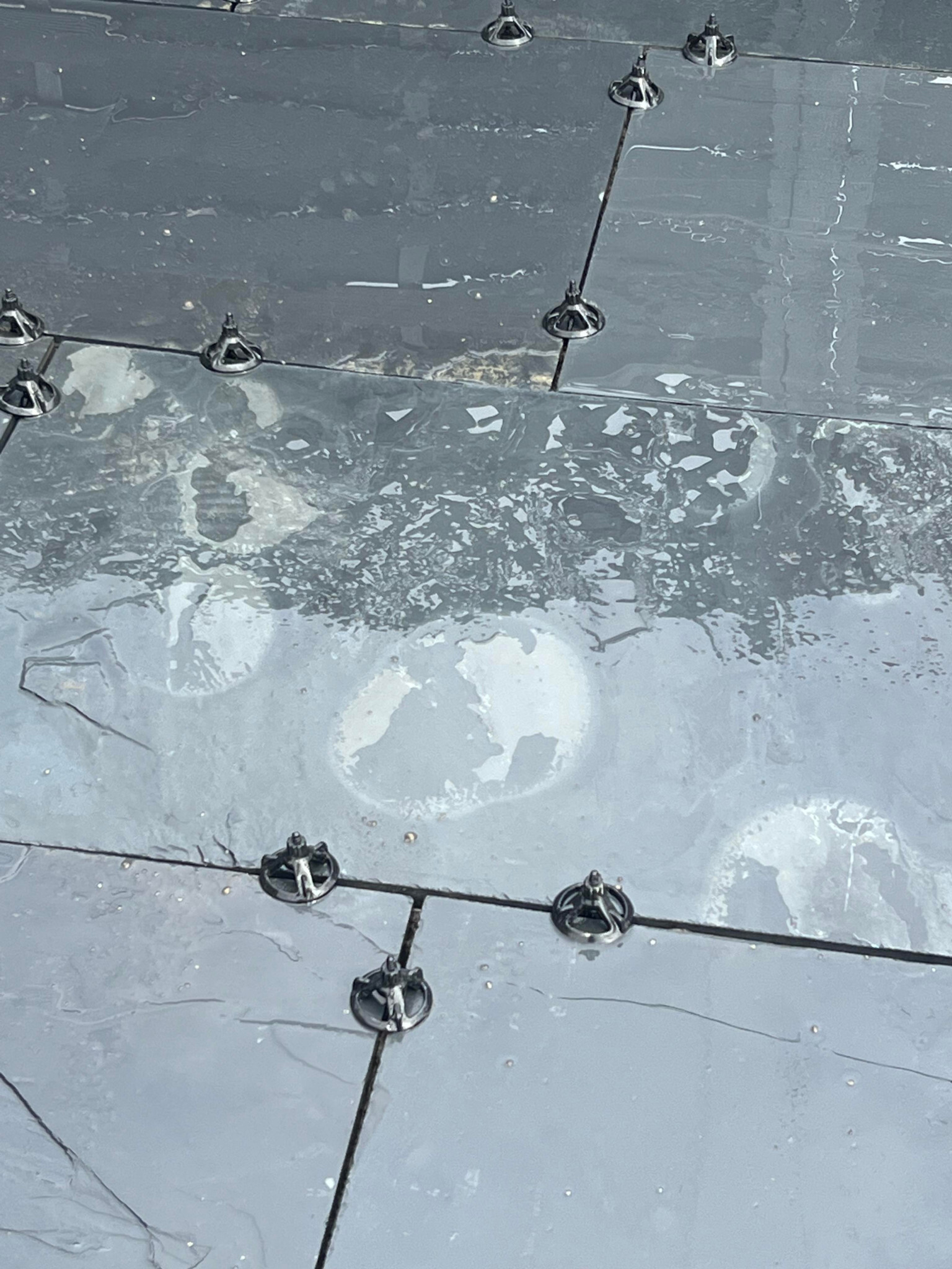 How to remove white markings from slate tiles