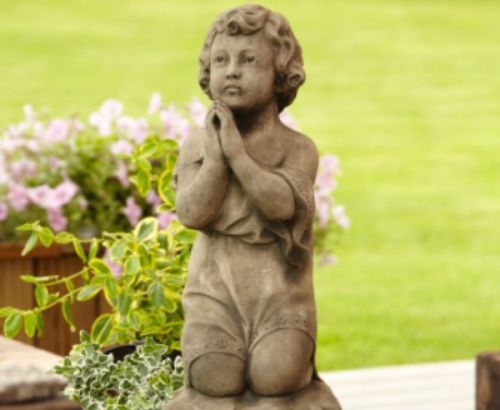Praying Girl on a Rock